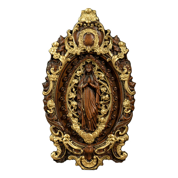 Wood carving of the Virgin Mary in leaves