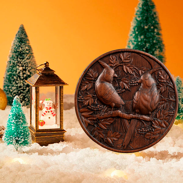 Wood carving of cardinal couple bringing good luck