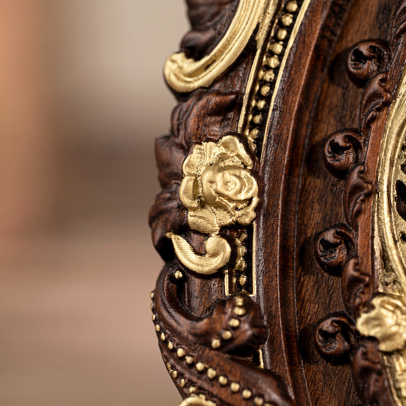 Wood carving of the Virgin Mary in leaves