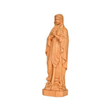 Round carving of Our Lady of Lourdes in beech wood: Sacred beauty, handcrafted technique